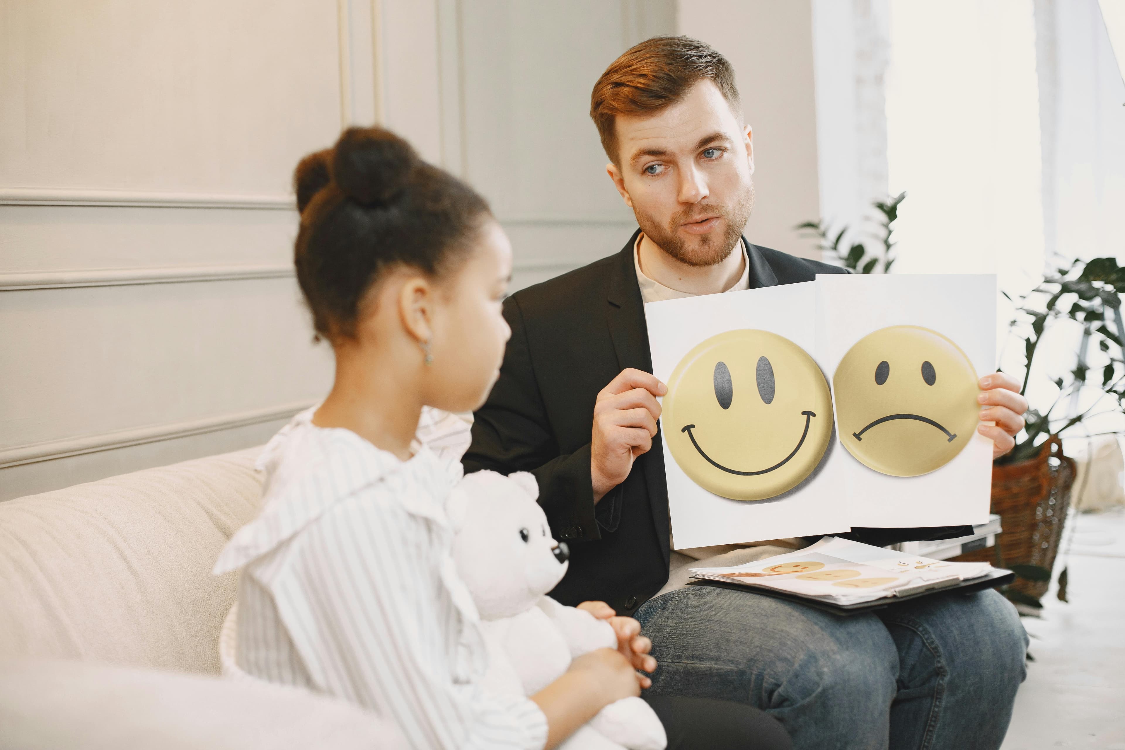 Therapist working with a child during an ABA session at Mint